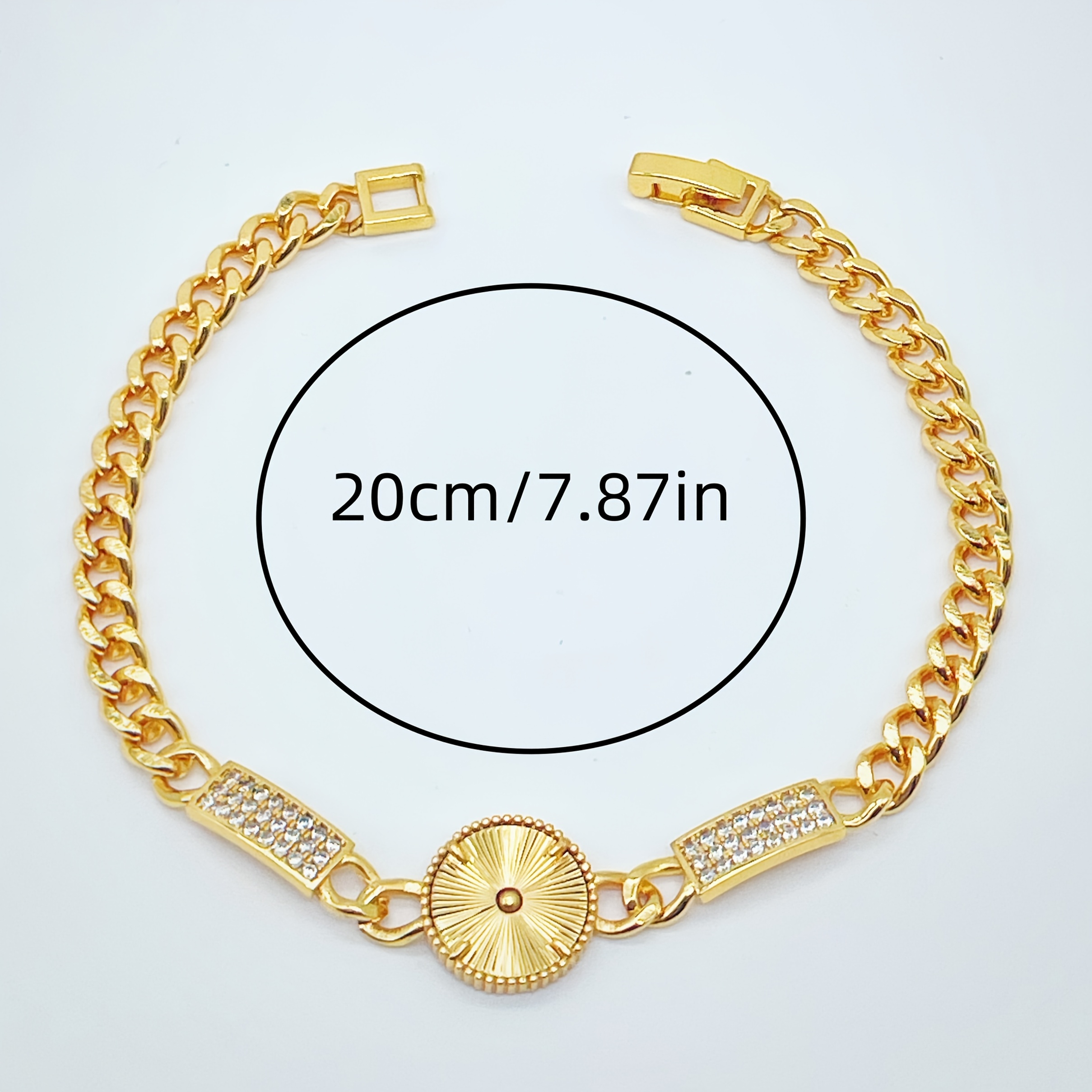 Golden Tone Bracelet with Sunburst Charm & Cubic Zirconia Accents